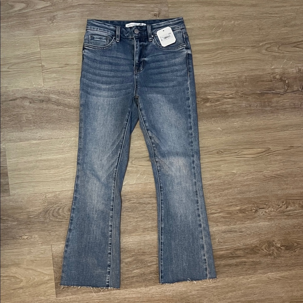 Altar'd State Mid Blue Flared Raw Hem Jeans